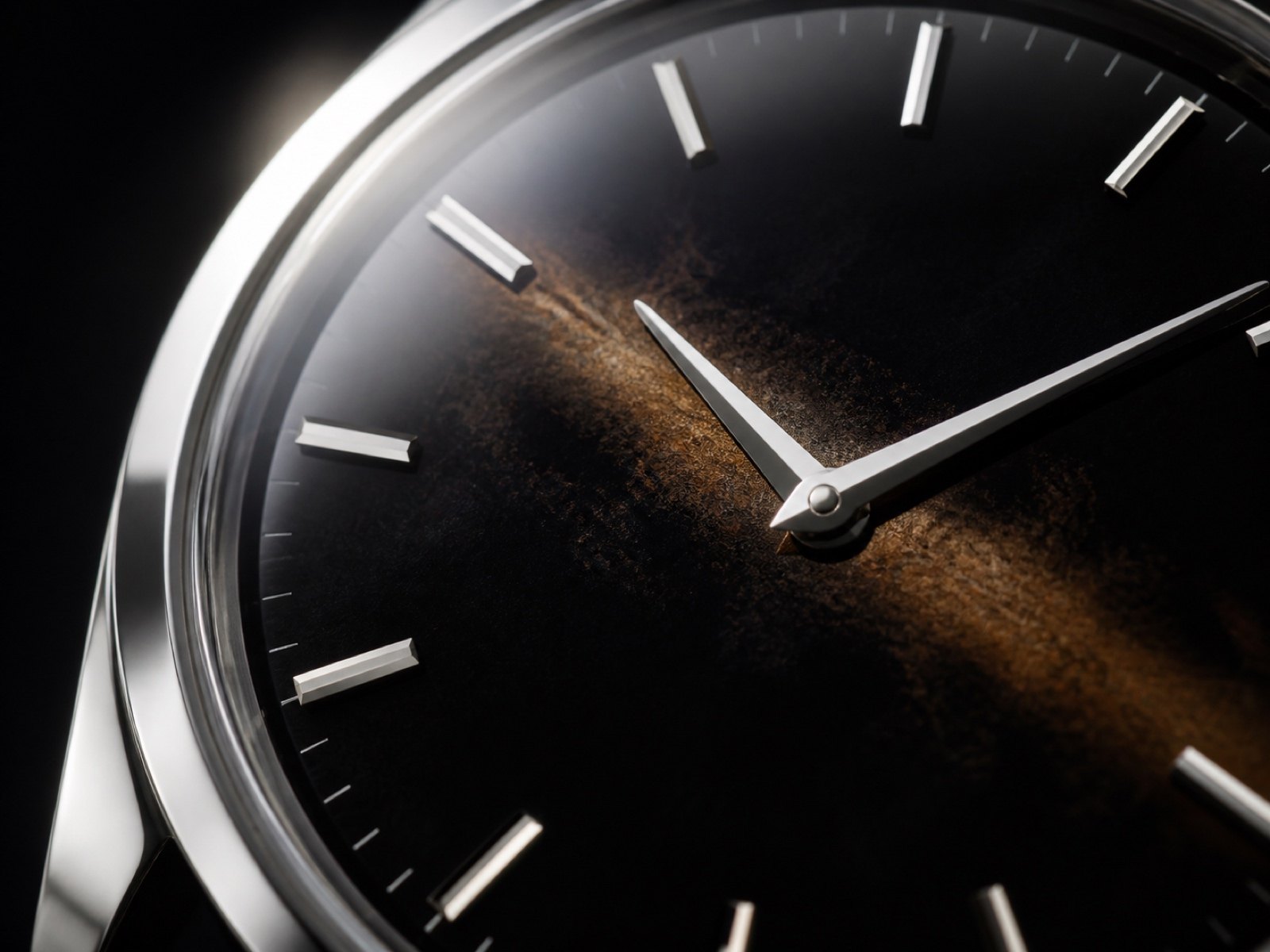 Macro view of a deep black lacquer watch dial under a sapphire crystal, showing warm brown depth where light crosses it